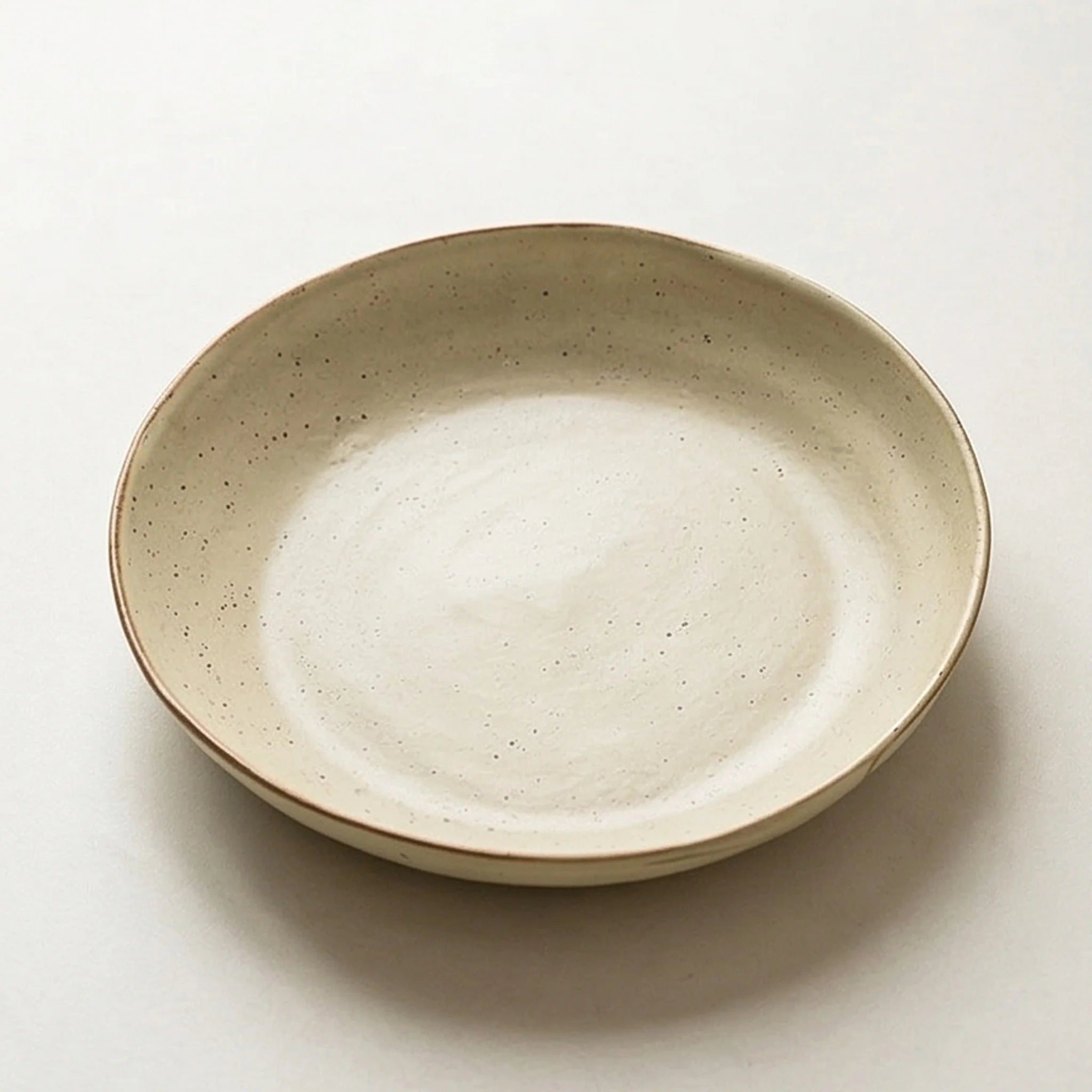 Japanese Retro Rustic Ceramic Deep Plate - 9-Inch Speckled Beige Dinnerware — studio white background product shot