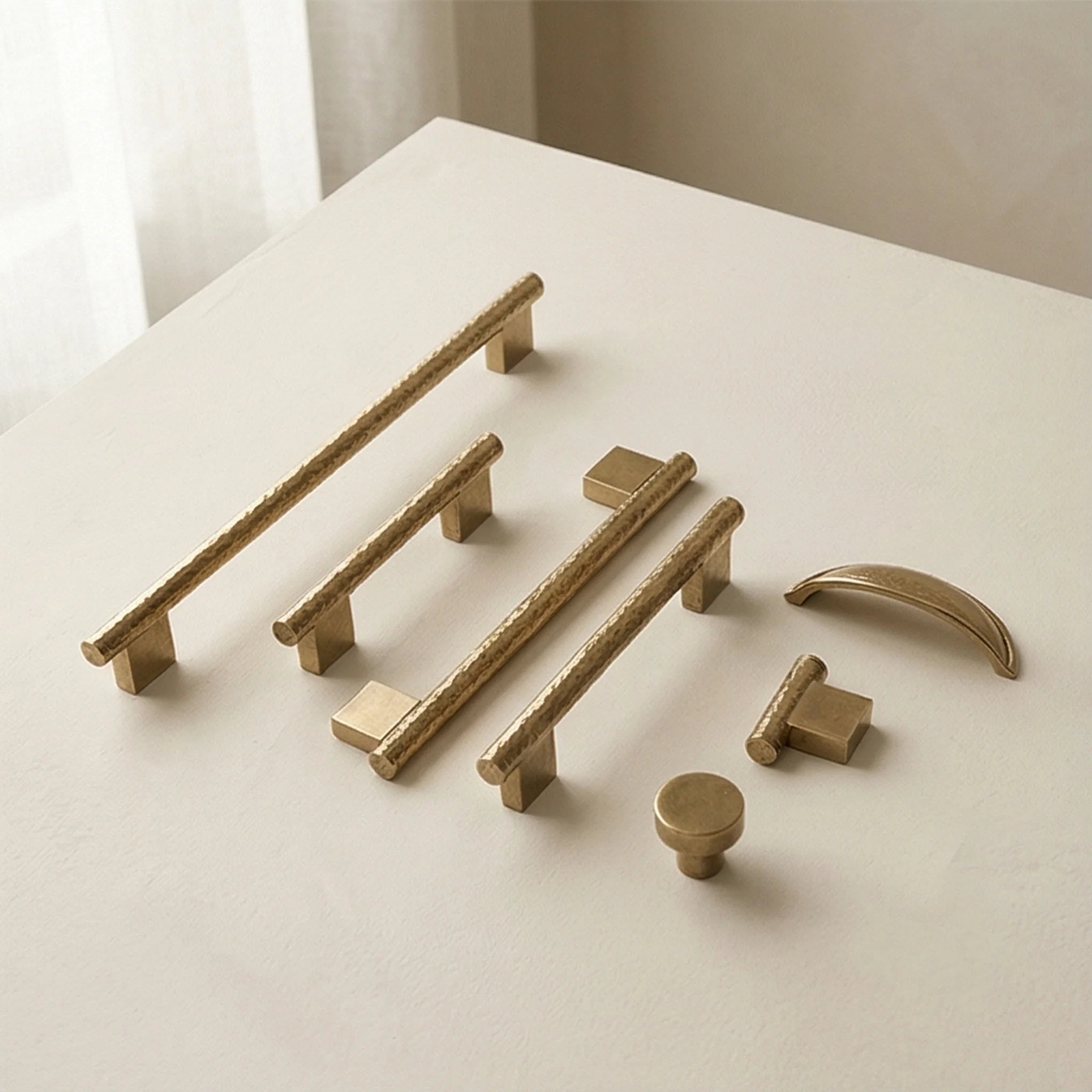 Handmade Hammered Brass Cabinet Pulls and Knobs - Luxury Gold Drawer Handles — studio white background product shot