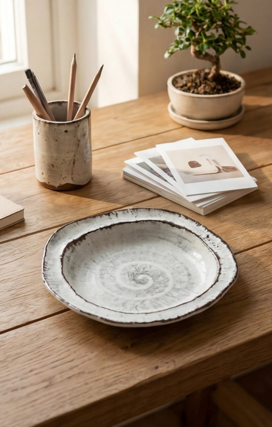 Handmade Irregular Ceramic Plate | Japanese Style Rustic Pottery Dish (19x18cm) — lifestyle scene with steaming coffee on a dark walnut desk