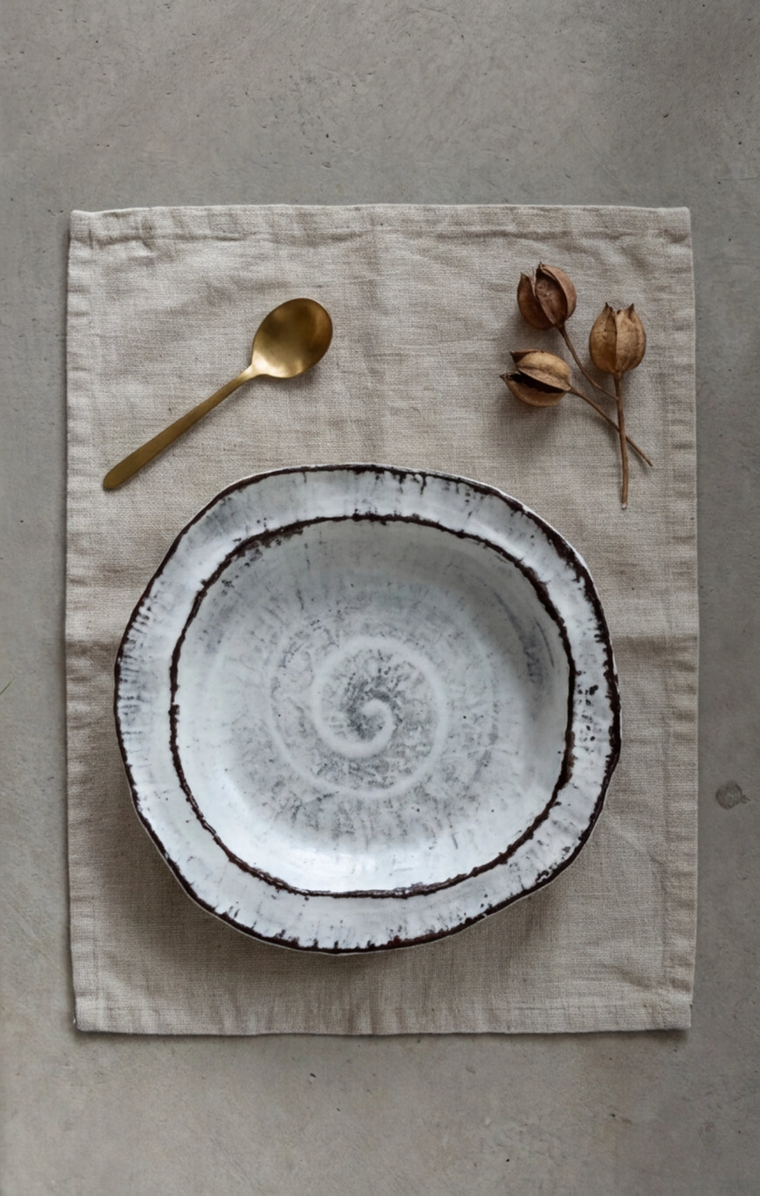 Handmade Irregular Ceramic Plate | Japanese Style Rustic Pottery Dish (19x18cm) — overhead flat-lay with a book and wooden coaster