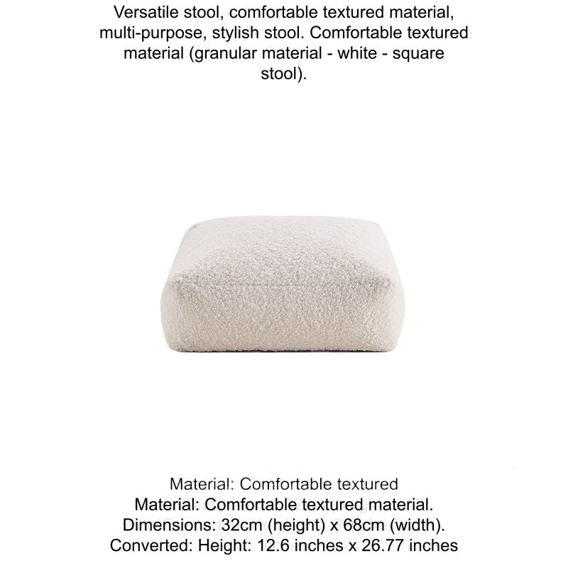 White fluffy square bean bag chair cushion, cozy textured seating for living room.