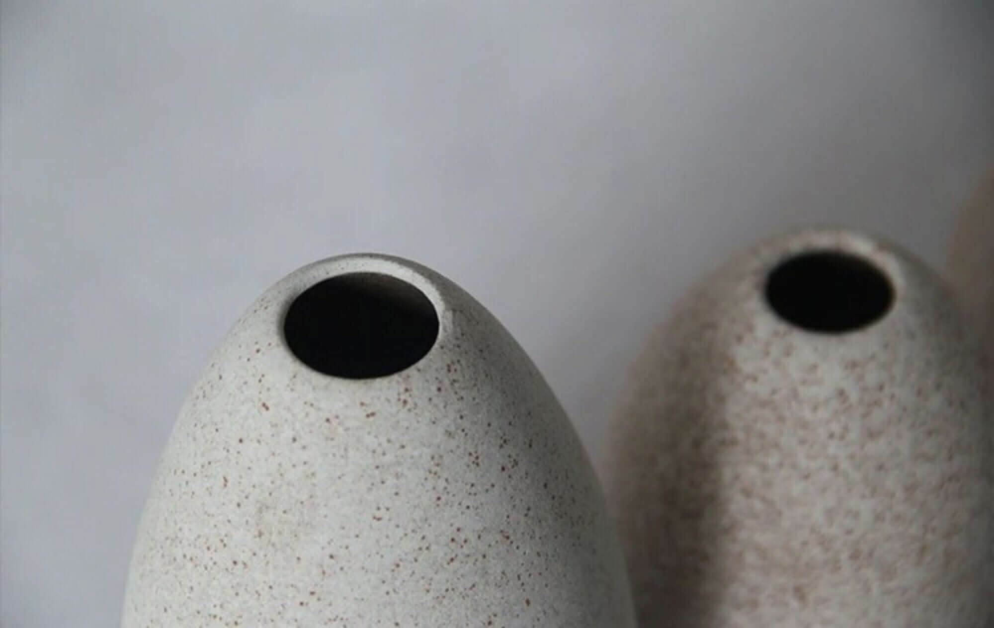 2x1 Ceramic Small Cream Vase with speckled texture on light gray background.