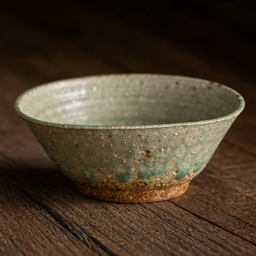 Handmade ancient copper-green glazed ceramic bowl