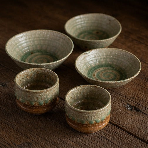 Handmade ancient copper-green glazed ceramic bowl