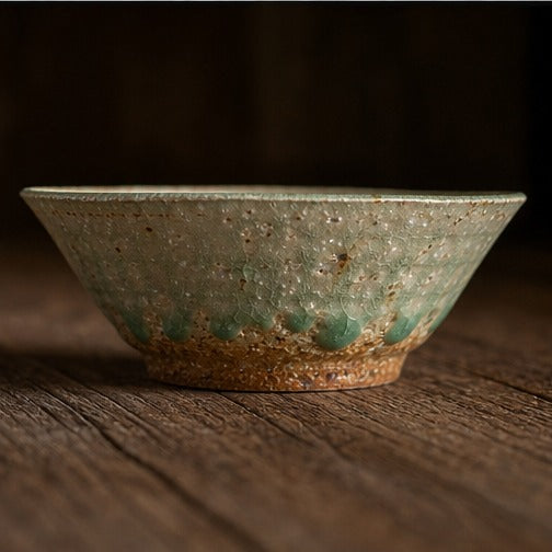 Handmade ancient copper-green glazed ceramic bowl