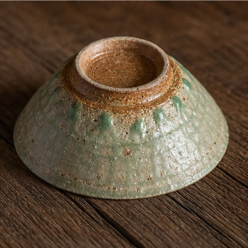 Handmade ancient copper-green glazed ceramic bowl