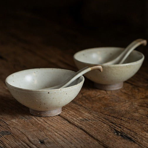 Handmade speckled ceramic rice bowl with matching spoon