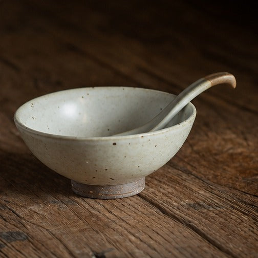 Handmade speckled ceramic rice bowl with matching spoon