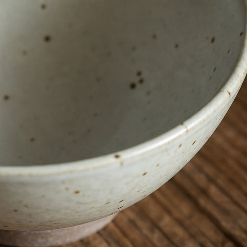 Handmade speckled ceramic rice bowl with matching spoon
