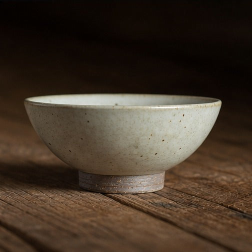 Handmade speckled ceramic rice bowl with matching spoon