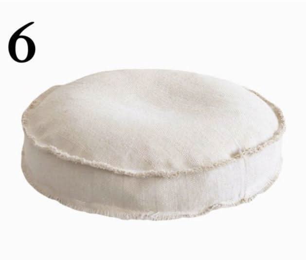 Natural cotton distressed meditation pillow with raw edges, refillable wabi-sabi cushion.