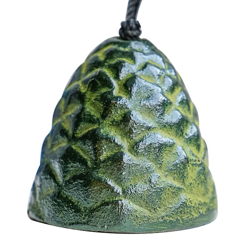 Green ceramic Japanese Pine Cone Wind Chime for home decor.