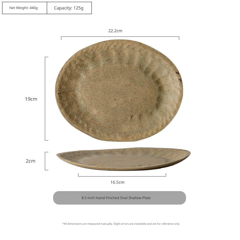An oval, rustic, textured ceramic plate with dimensions marked.