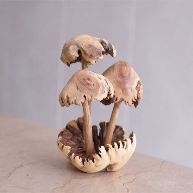Hand-carved mushroom sculpture made of natural wood, unique home decor accent.