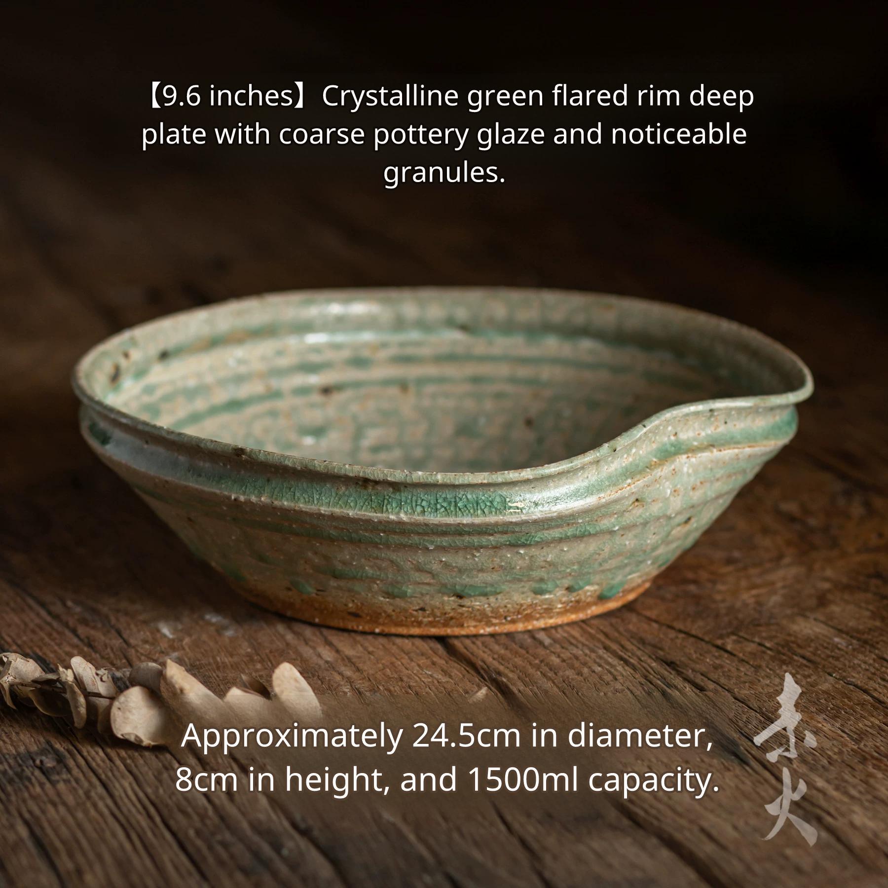 Large (24.5cm) deep ceramic bowl with rough, speckled glaze, suitable for large servings.