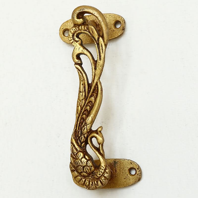 Antique brass Phoenix double door handle, handmade with intricate peacock design.