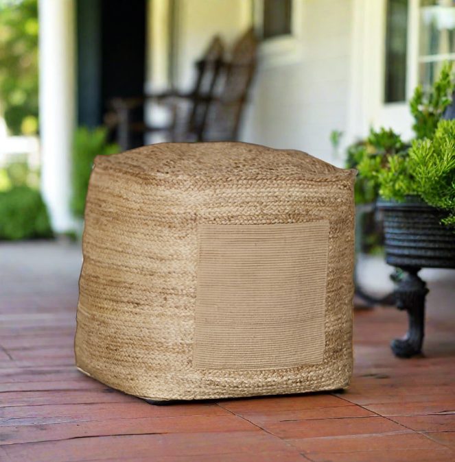 Indian Hand-Woven Natural Jute Ottoman with textured panel, on a porch.