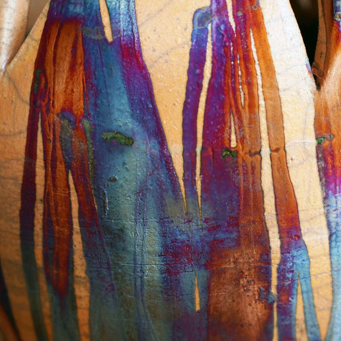 RAAQUU flower vase, vibrant raku colors, unique design.