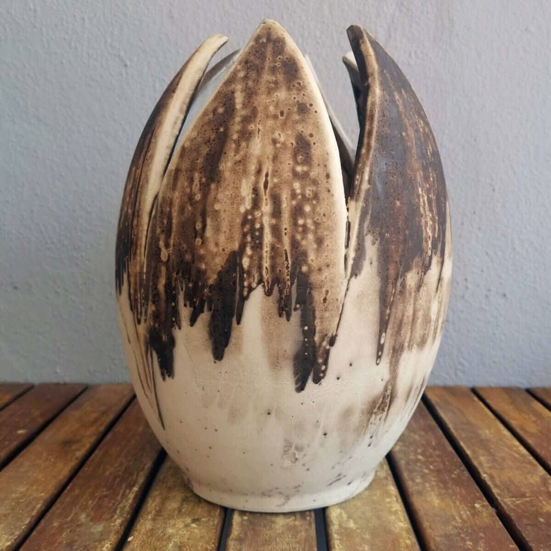 Large, flower-shaped ceramic vase;  brown and beige; raku firing.