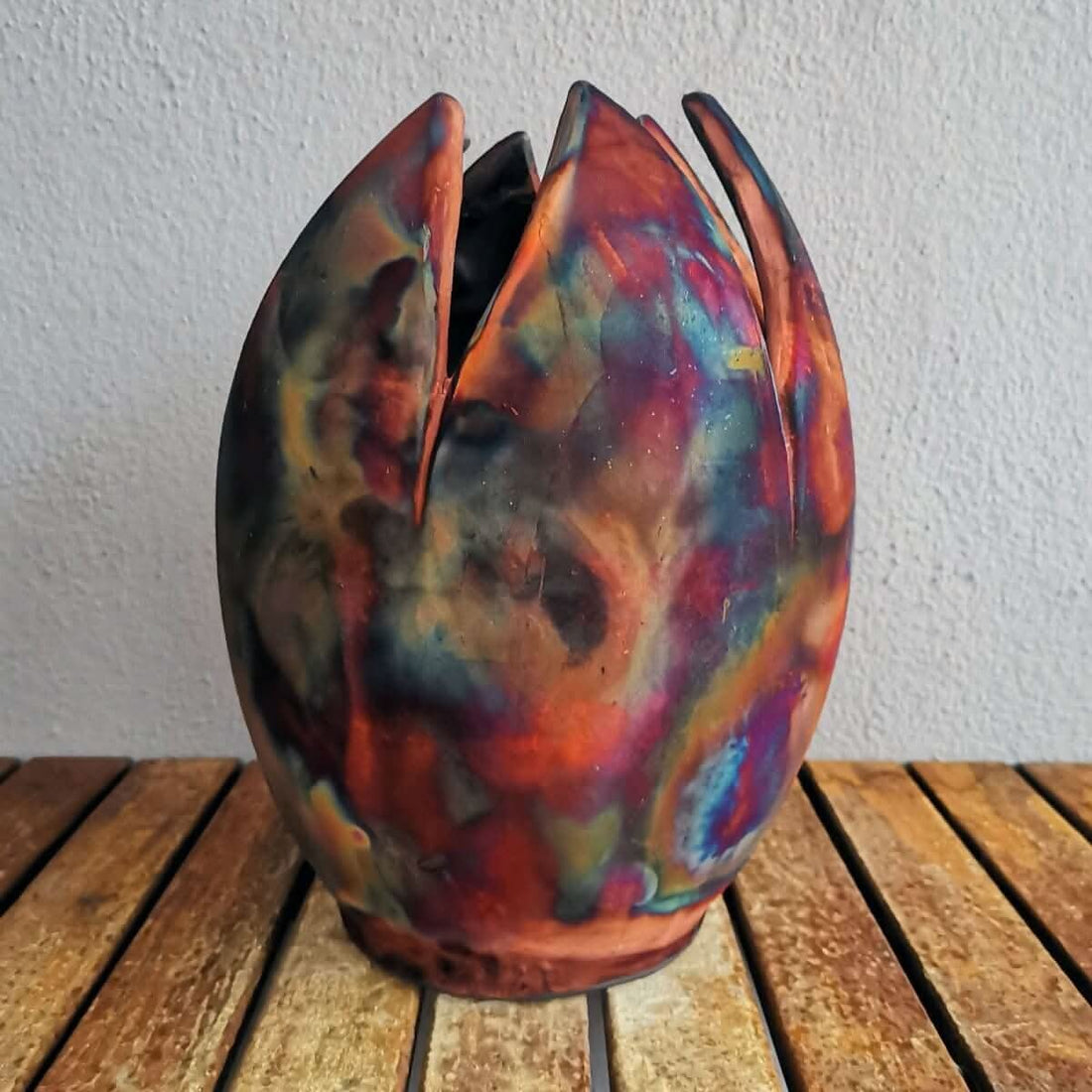 Multicolored raku flower vase, 11" tall, unique design.