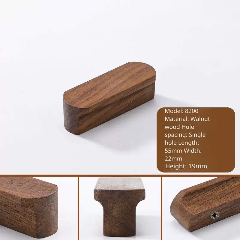 Close-up of a short, solid walnut cabinet handle, model 8200, 55mm length.