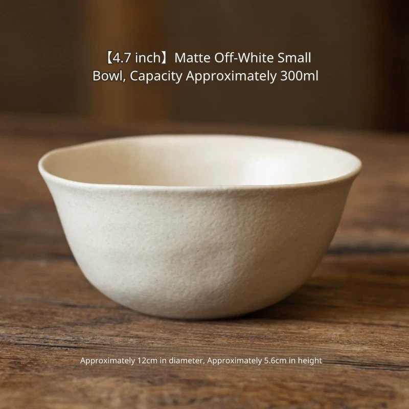 Large, deep, off-white ceramic bowl with a textured exterior, 300ml capacity, on wood.