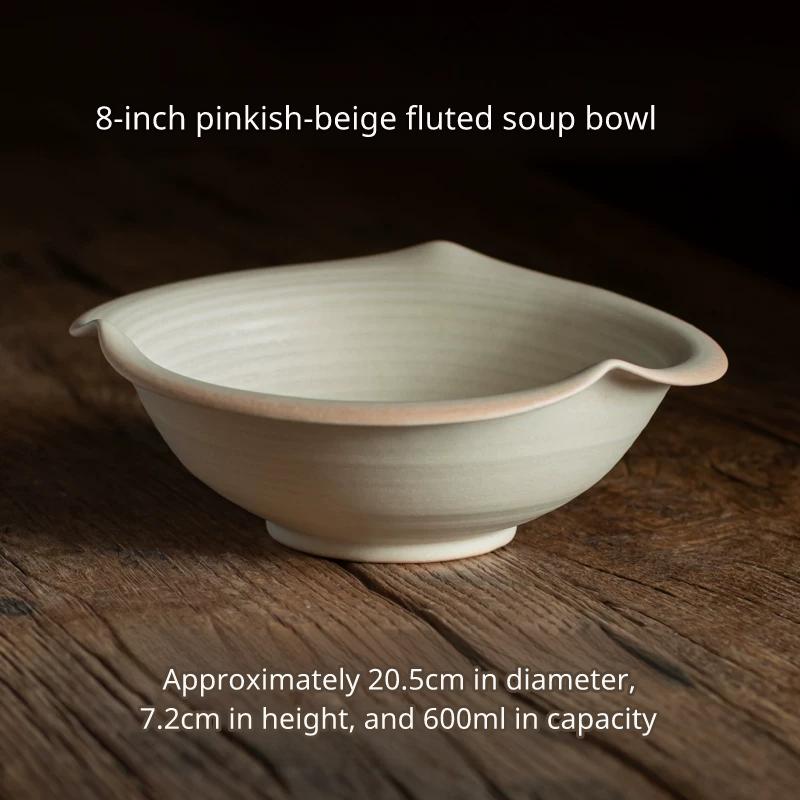Large 8-inch light cream ceramic soup/noodle bowl with a distinct, wavy, angular rim.