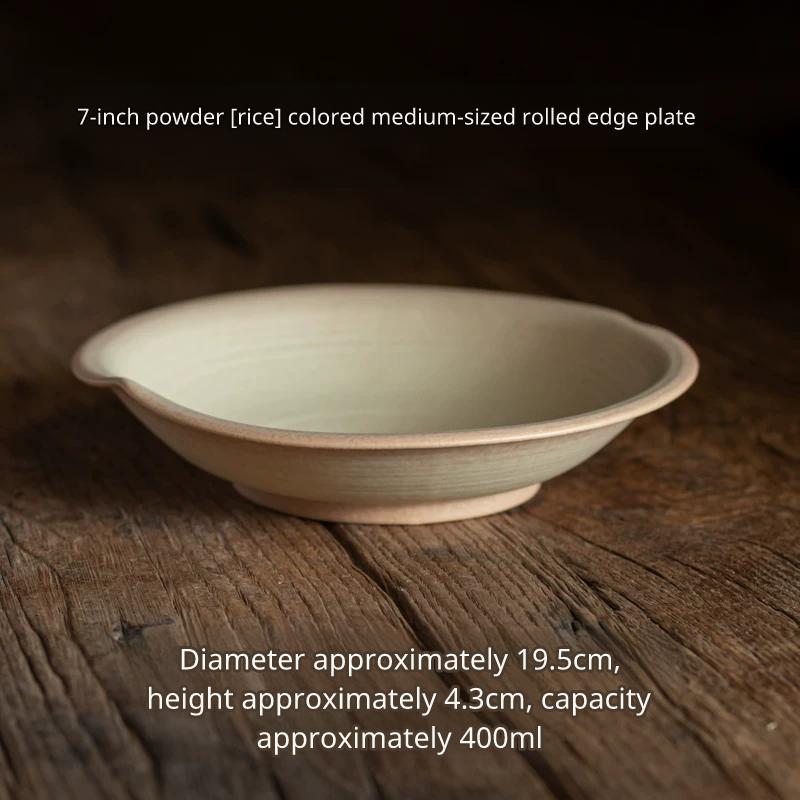 Light cream/rice colored ceramic shallow bowl with slightly flared rim, 19.5cm diameter.