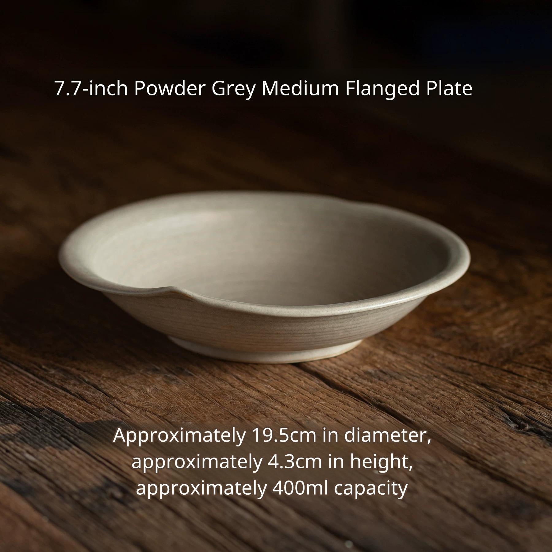 Light gray/ash colored ceramic shallow bowl with slightly flared rim, 19.5cm diameter.