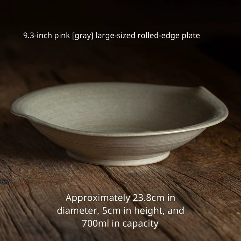 Large, light gray/ash colored ceramic shallow bowl with an organic, flared rim, 23.8cm diameter.