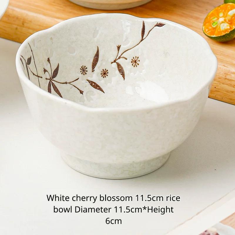 White ceramic rice bowl with brown cherry blossom pattern, Chinese text describing size.