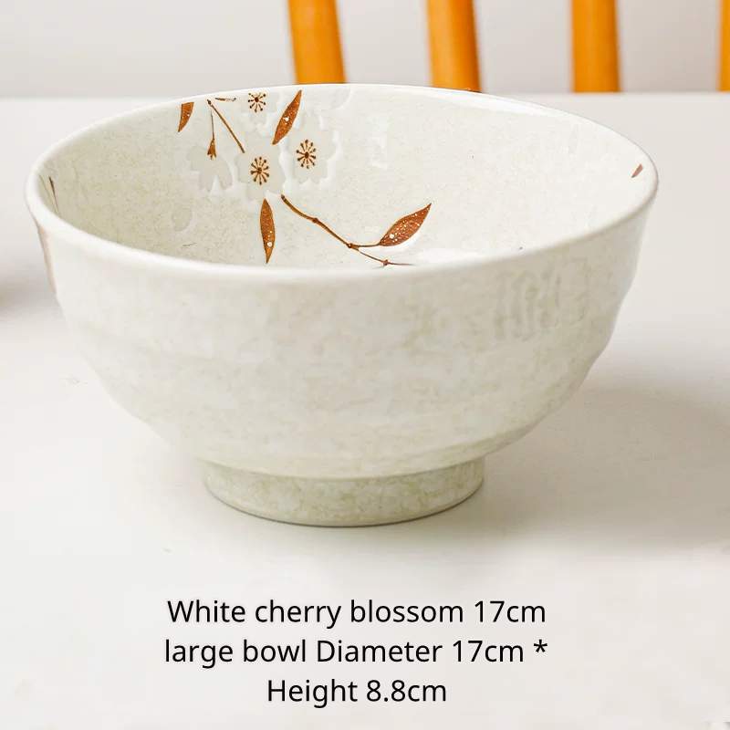 Large white ceramic ramen or noodle bowl with brown cherry blossom pattern, Chinese text describing size.