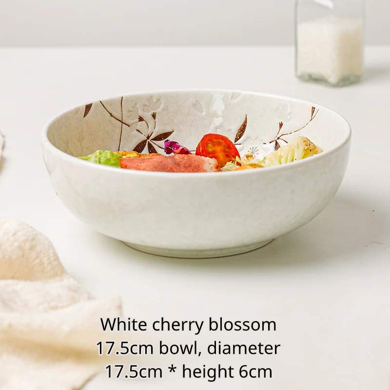 White cherry blossom 17.5cm face bowl filled with salad. Diameter 17.5cm, height 6cm.