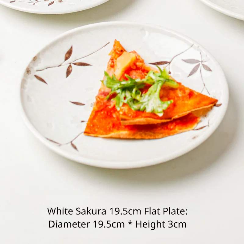 White cherry blossom 19.5cm flat plate with a slice of pizza. Diameter 19.5cm, height 3cm.