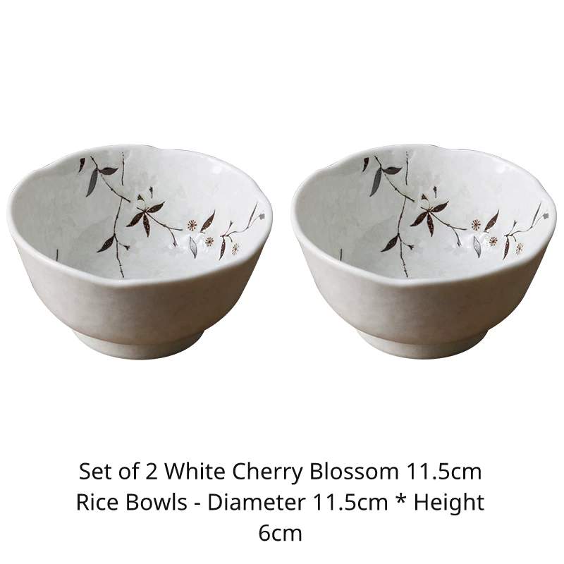 Pair of white cherry blossom 11.5cm rice bowls. Diameter 11.5cm, height 6cm, sold as a set of two.