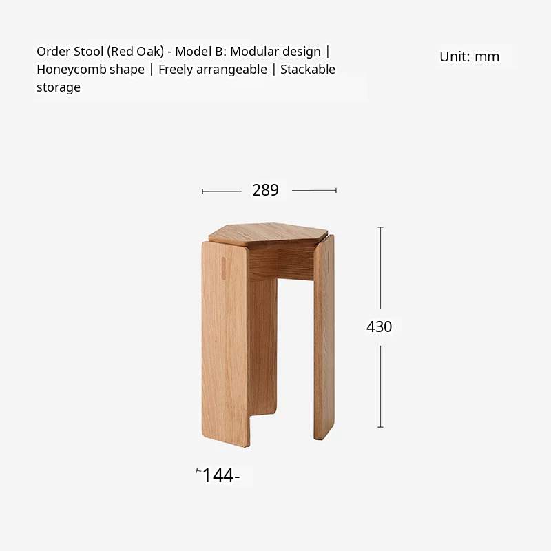 A minimalist solid wood stackable stool with a geometric design, serving as a versatile seat or side table.