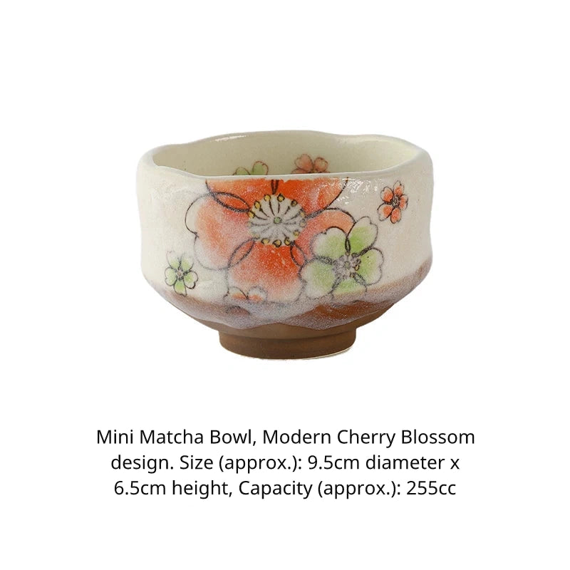 Mini matcha bowl (chawan) with modern orange flower design, approx. 9.5cm diameter.