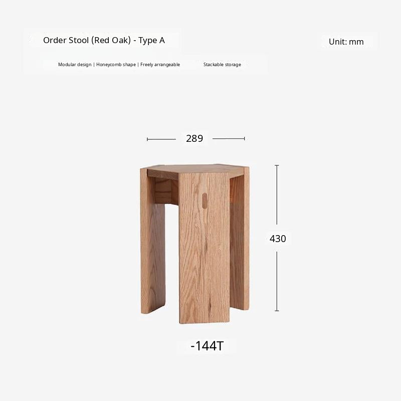 A minimalist solid wood stackable stool with a geometric design, shown as a natural wood side table.