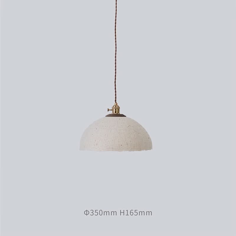 Textured off-white paper mache lamp shade hanging pendant light.