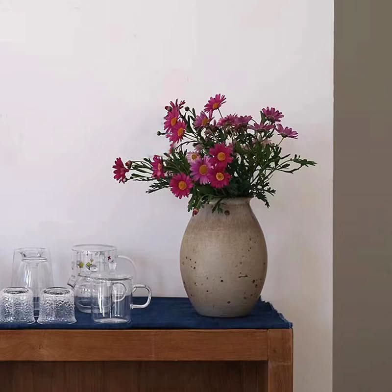 Clay speckled ceramic vase with pink flowers, home decor.