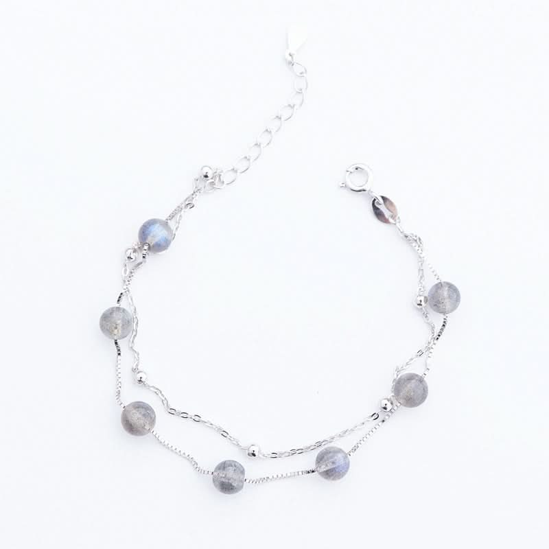Two-strand s925 silver bracelet with gray moonstone beads and small silver accent beads.