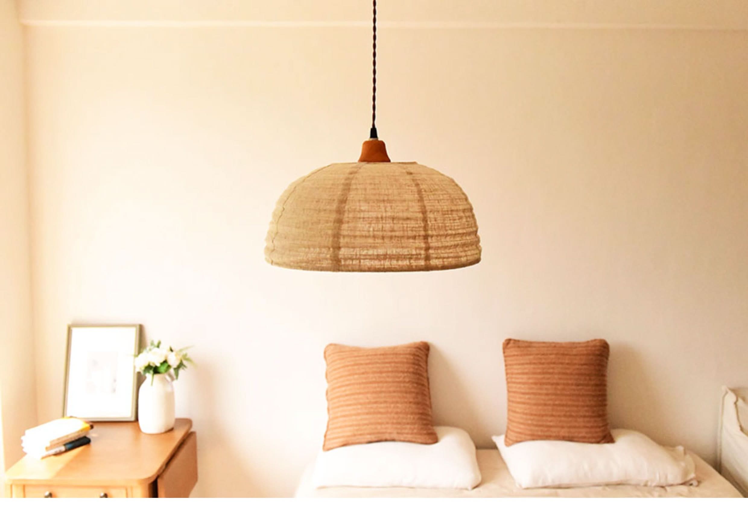Dome lamp shade with natural hemp fabric, featuring a warm, earthy tone.
