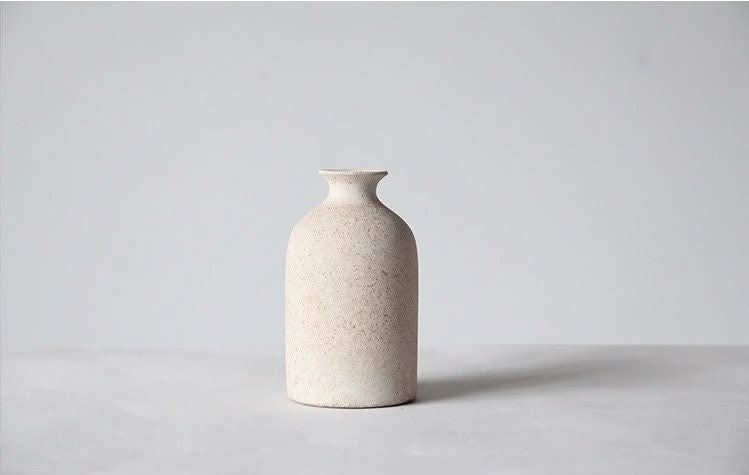 2x1 Ceramic Small Cream Vase with speckled texture, perfect for home decor.