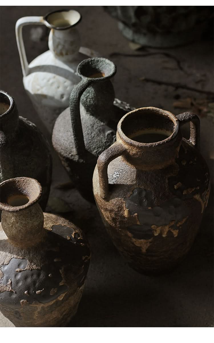 Wabi-sabi small ceramic vase: earthy, textured vases in natural tones, arranged for home decor.