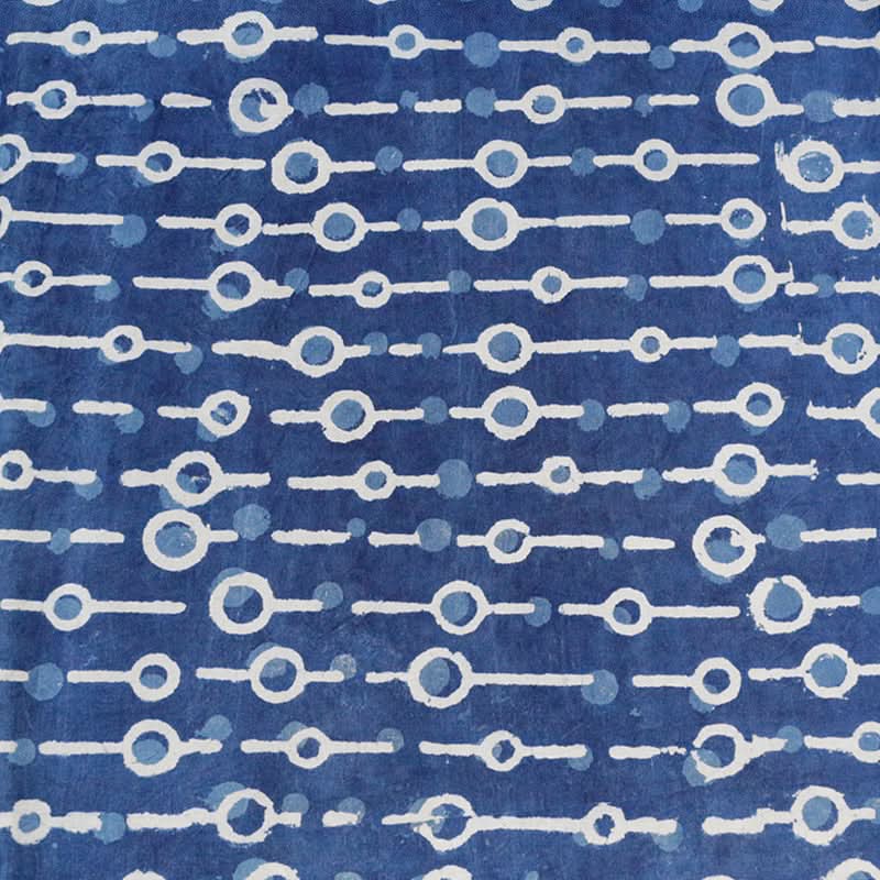 Blue dyed Indian fabric pure cotton plant-dyed home decor with white chain link pattern.