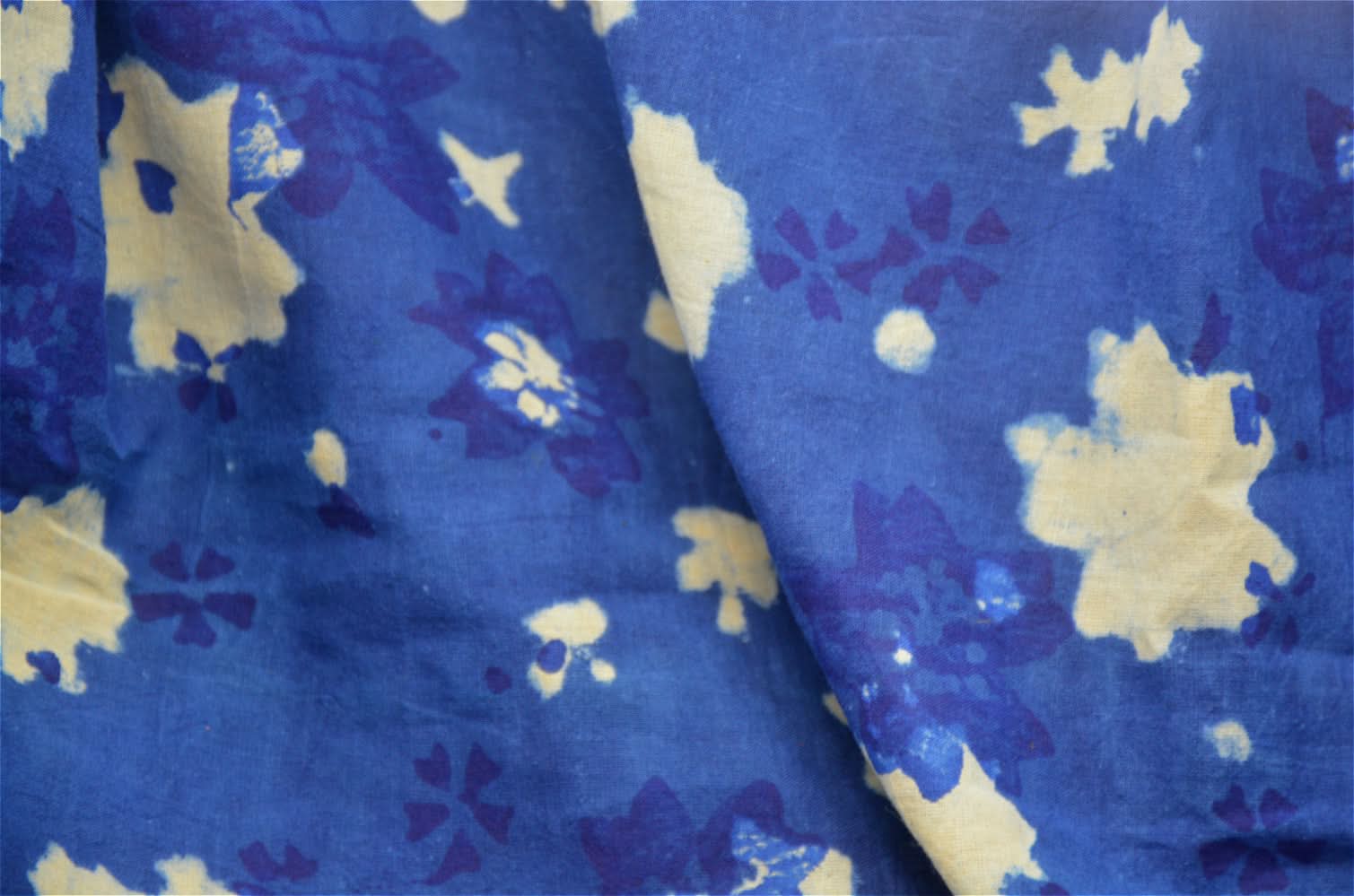 Natural indigo Indian fabric with blue floral print, perfect for tablecloths, decor, clothing, and DIY.