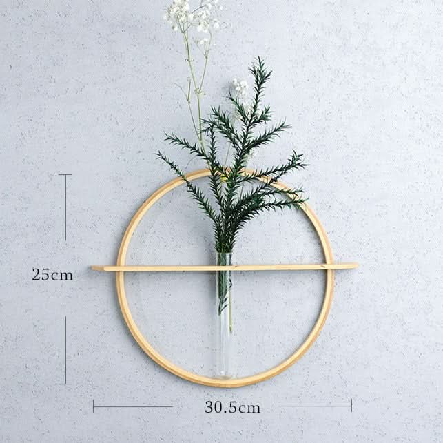 Wooden circle wall flower vase with glass tube holder for minimalist home decor.