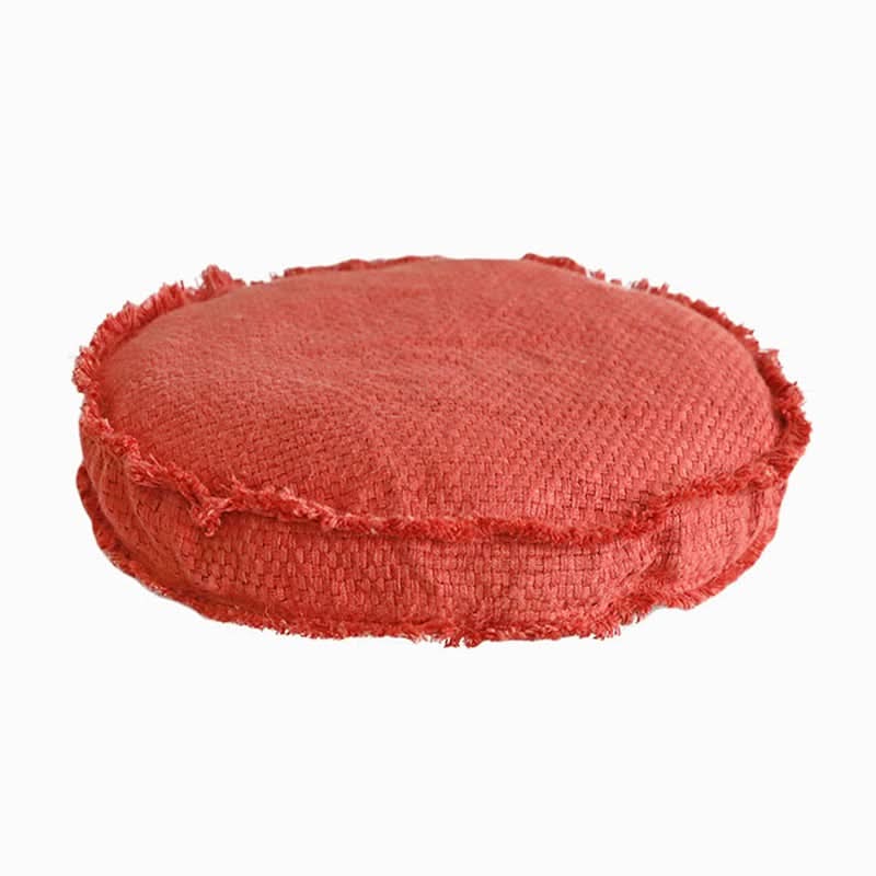 Coral textured floor cushion with frayed edges. Customizable and washable.