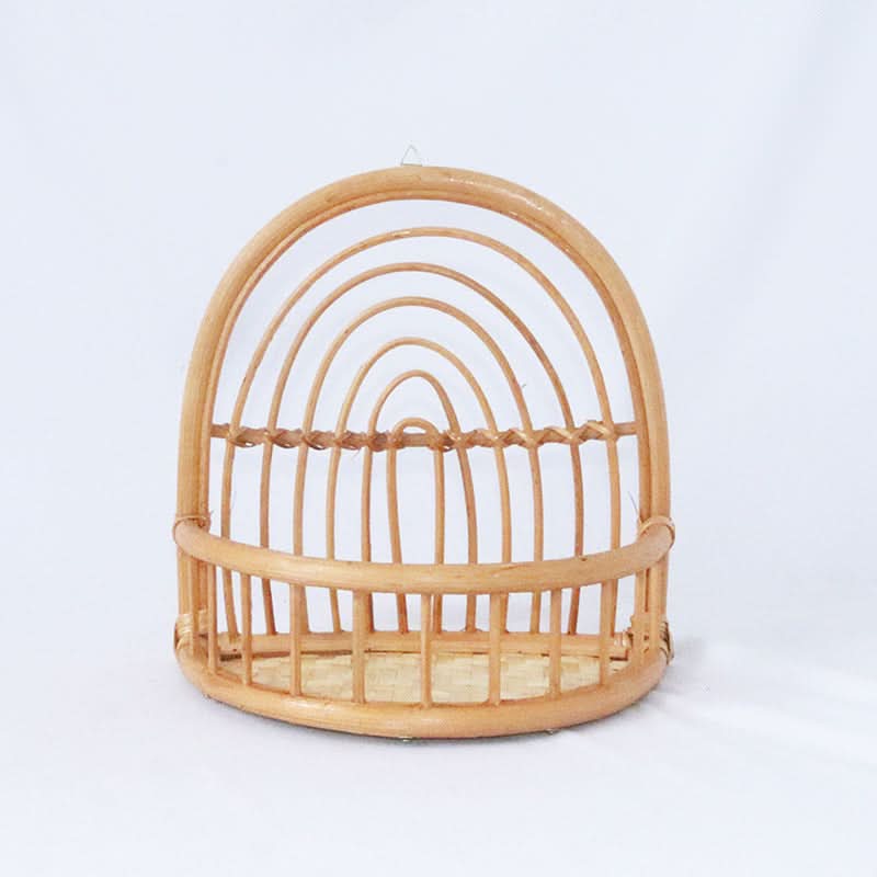 Woven rattan Rainbow Wall Basket shelf in natural tone, on white background.