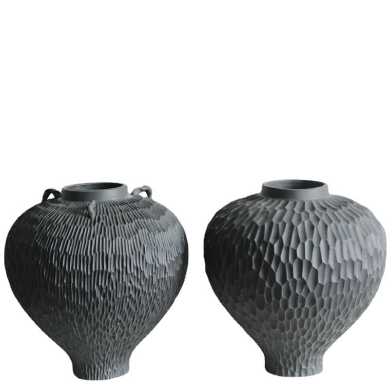 Wabi-Sabi carved irregular black ceramic vase, textured home decor accent piece.